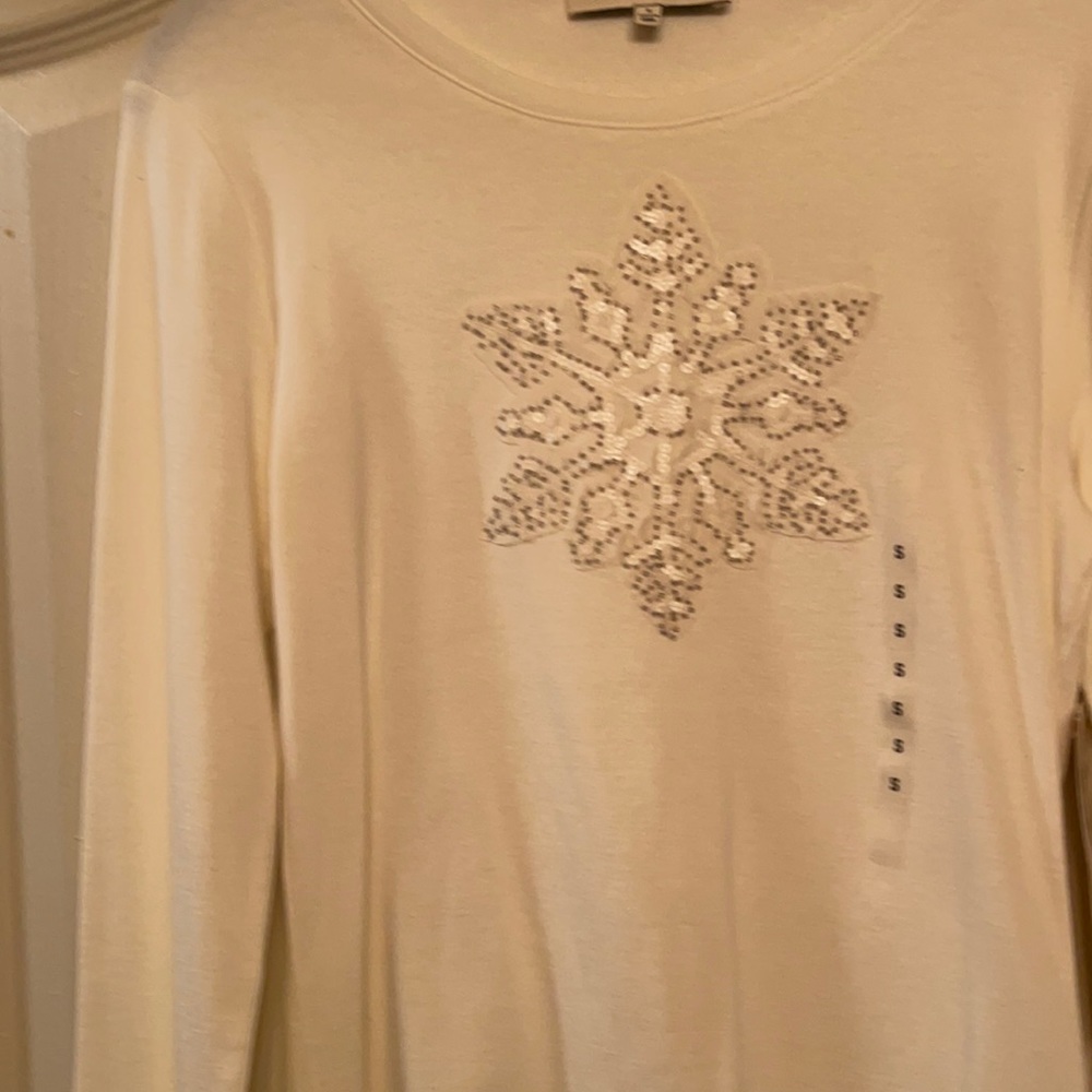 Ivory jersey.